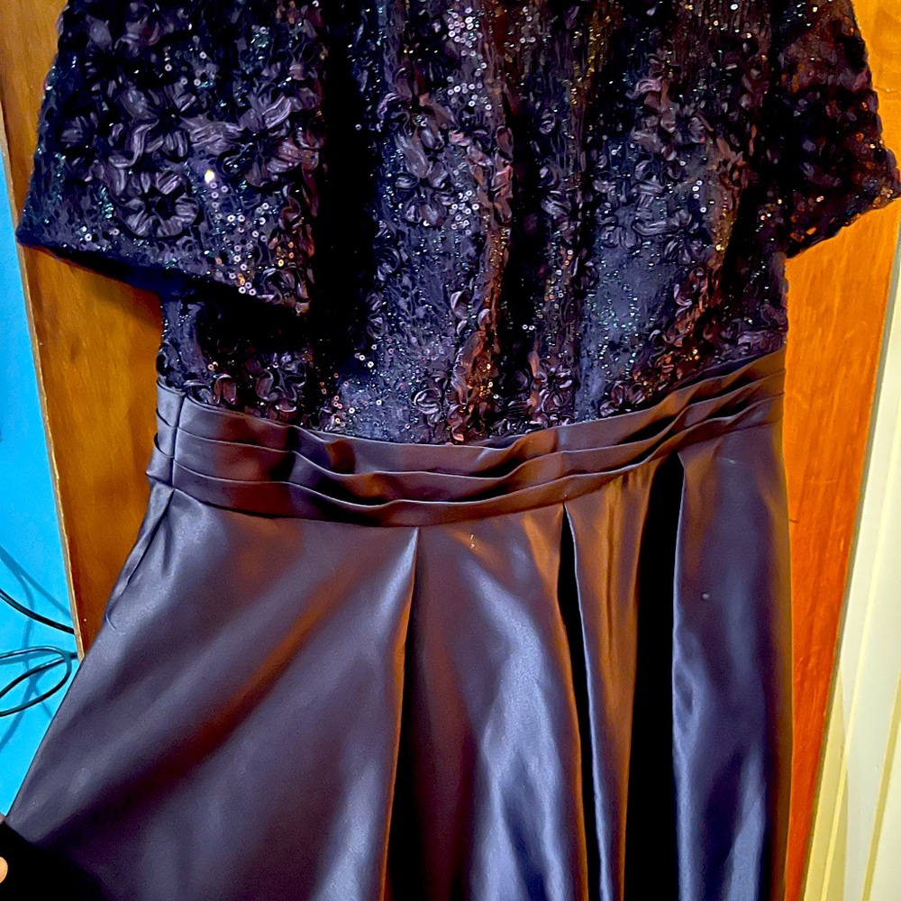 A burgundy dress from David’s bridal has pockets on the side